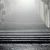 greyscale photography of concrete stairways